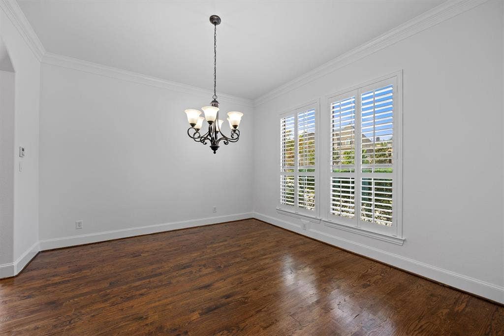 5960 Indigo Sky Drive, Frisco, TX 75036 The dining room is conveniently located off the kitchen with the natural light shining through the front window!