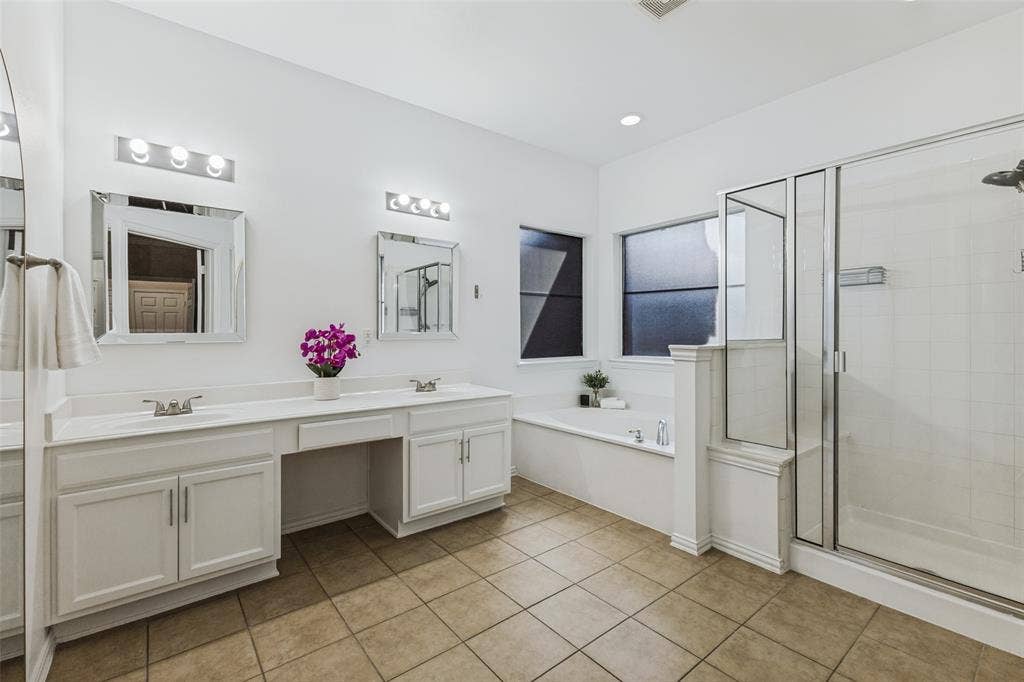 4600 Bonnywood Drive, Mesquite, TX 75150 Modern ensuite bath with two vaniites, separate tub and glass shower