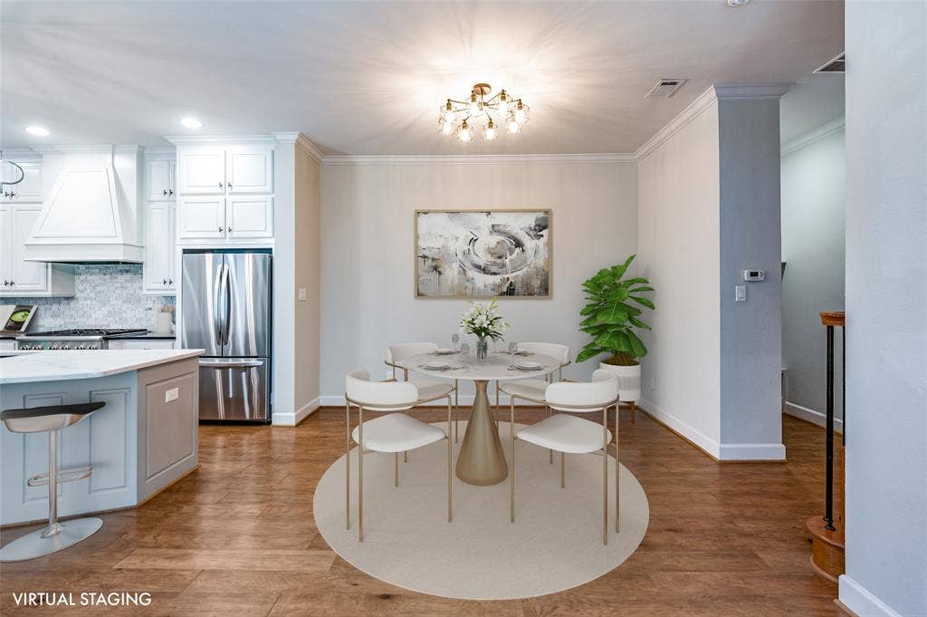 The breakfast area sits just off the kitchen, creating an easy space for casual dining & everyday meals.
