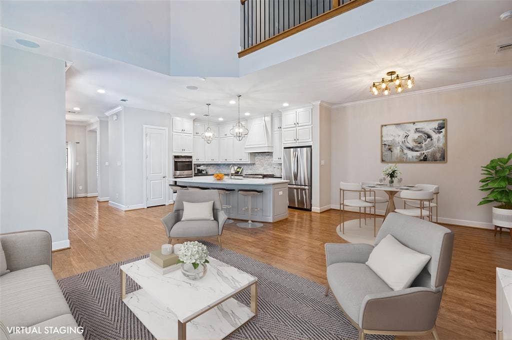 Generously sized living area offers plenty of room for gathering, entertaining & everyday relaxation.