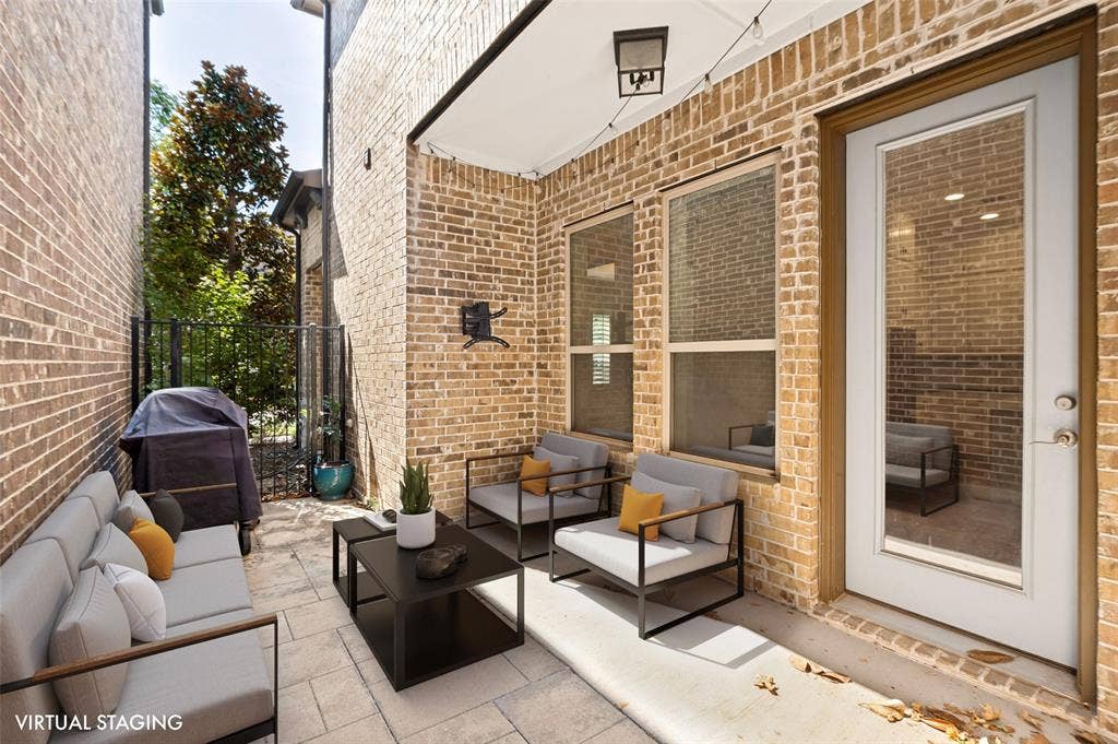 Charming private patio creates a cozy outdoor escape for morning coffee, dining al fresco & evenings outside as cooler fall weather arrives.