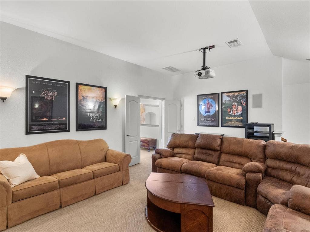 Media room has two entries, one off of the game room and the other by means of a secondary staircase