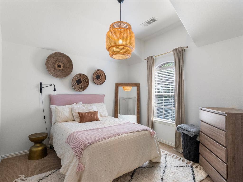 Secondary upstairs bedroom with upgraded lighting