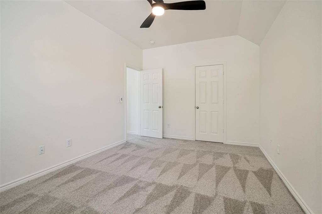 1516 Cedar Grove Court, Allen, TX 75002 Vaulted ceiling, ceiling fan, neutral paint palette, paneled doors, and patterned carpet