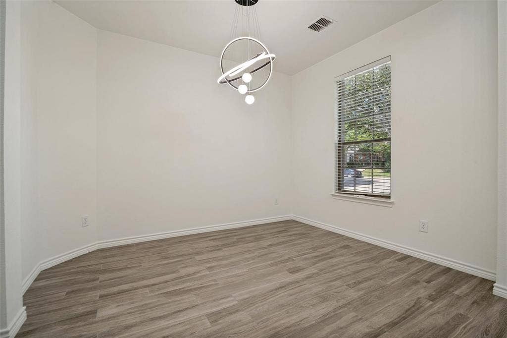 1516 Cedar Grove Court, Allen, TX 75002 White walls and wood-finish flooring