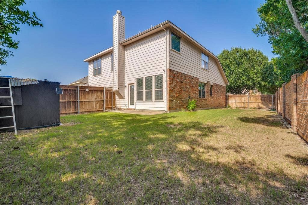 1516 Cedar Grove Court, Allen, TX 75002 Expansive grassy yard with a concrete patio