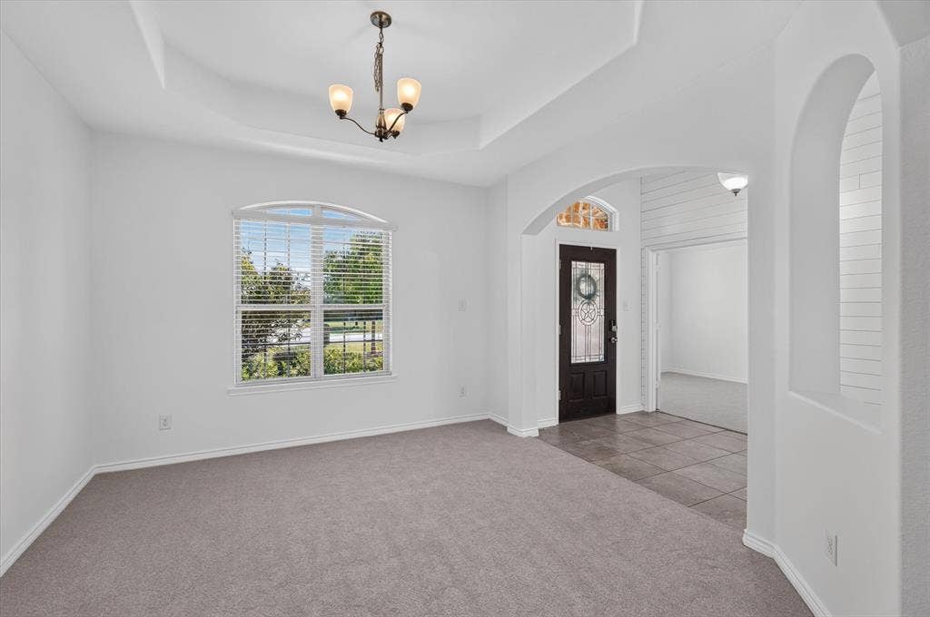 Tray ceiling with a decorative chandelier