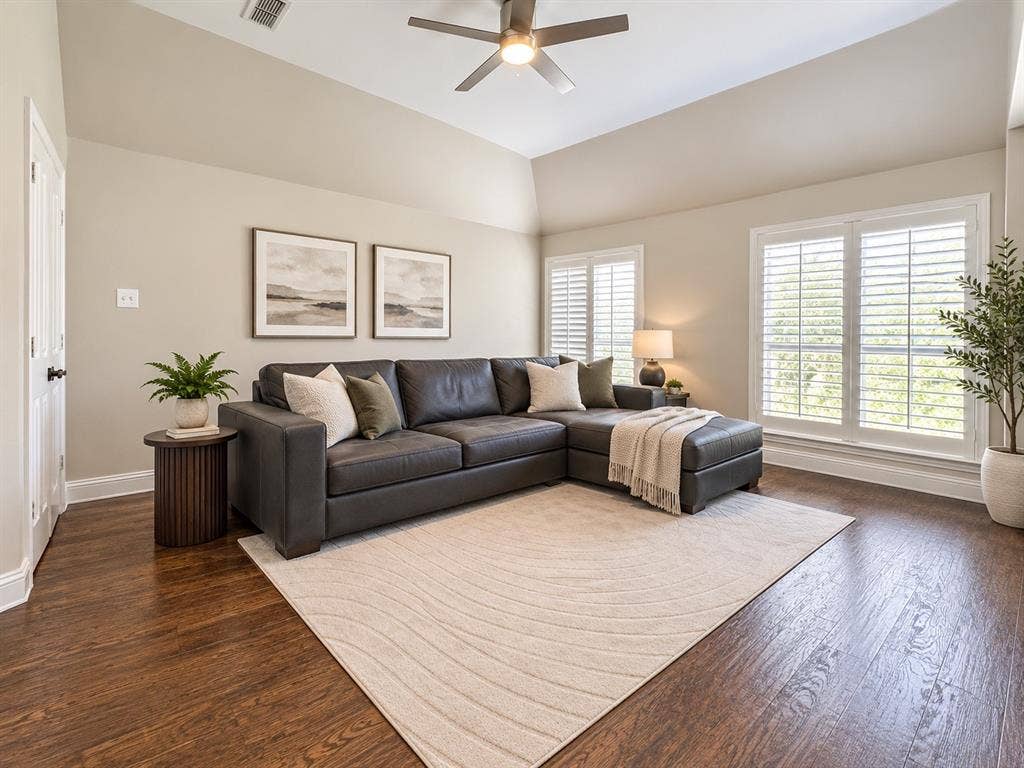 2912 Meadow Glen Drive, Flower Mound, TX 75022 Wood-finish flooring throughout, complemented by a vaulted ceiling with a ceiling fan