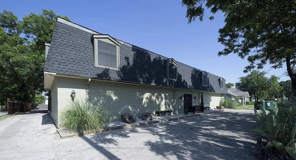1717 N Locust Street, #6, Denton, TX 76201 Dormer windows, shingle roof, exterior wall sconces, mature landscaping
