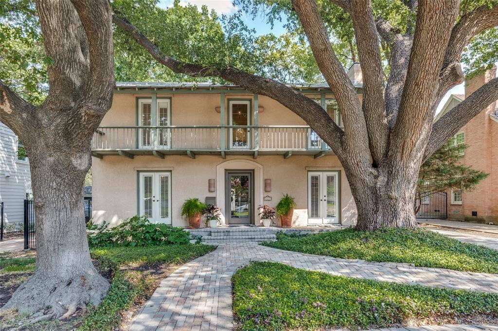 5411 W University Boulevard, Dallas, TX 75209 Beautiful trees line either side of the home