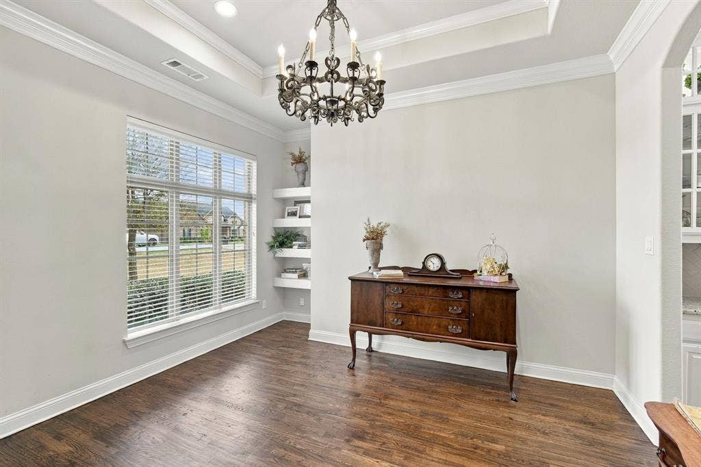 5620 Limestone Lane, Midlothian, TX 76065 Beautiul hardwood floors, tray ceiling, and shelving make this a perfect space for an office