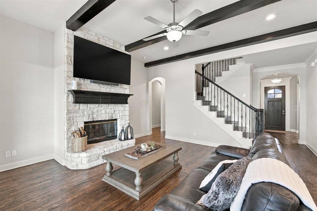 5620 Limestone Lane, Midlothian, TX 76065 Stone, wood burning fireplace and all wood staircase to the media room