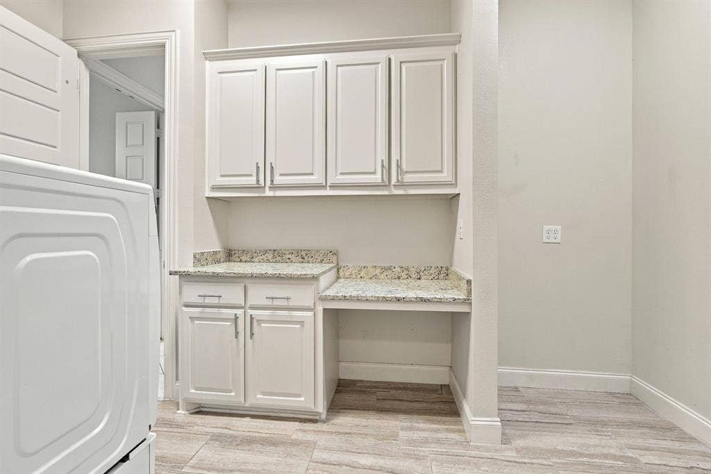 5620 Limestone Lane, Midlothian, TX 76065 Desk, folding area, and extra storage in the laundry room.