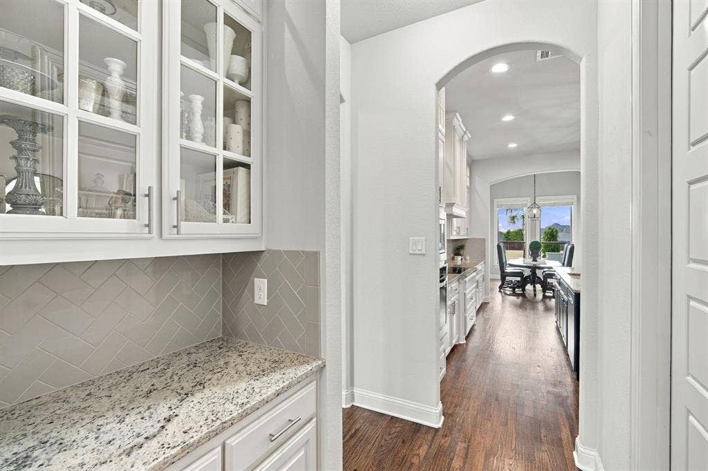 5620 Limestone Lane, Midlothian, TX 76065 Coffee Bar with upper cabinet lighting, storage, and granite countertops