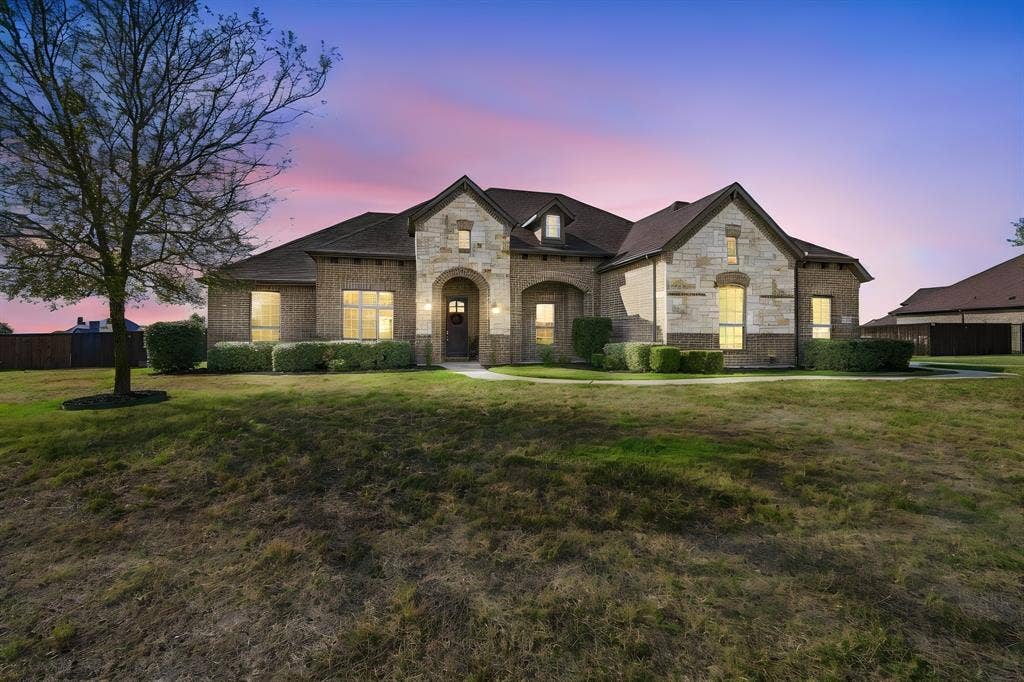 5620 Limestone Lane, Midlothian, TX 76065 Front Elevation at twilight
