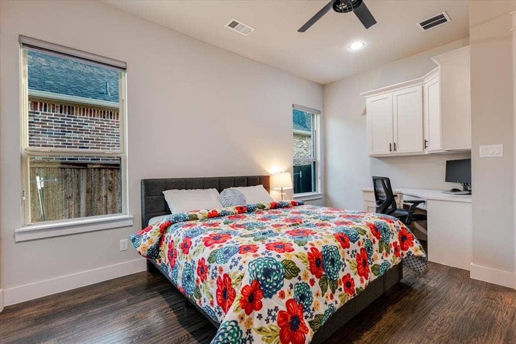 4102 Parkview Boulevard, Celina, TX 75009 Wood-finish flooring, built-in desk, white cabinetry, recessed lighting, and a ceiling fan