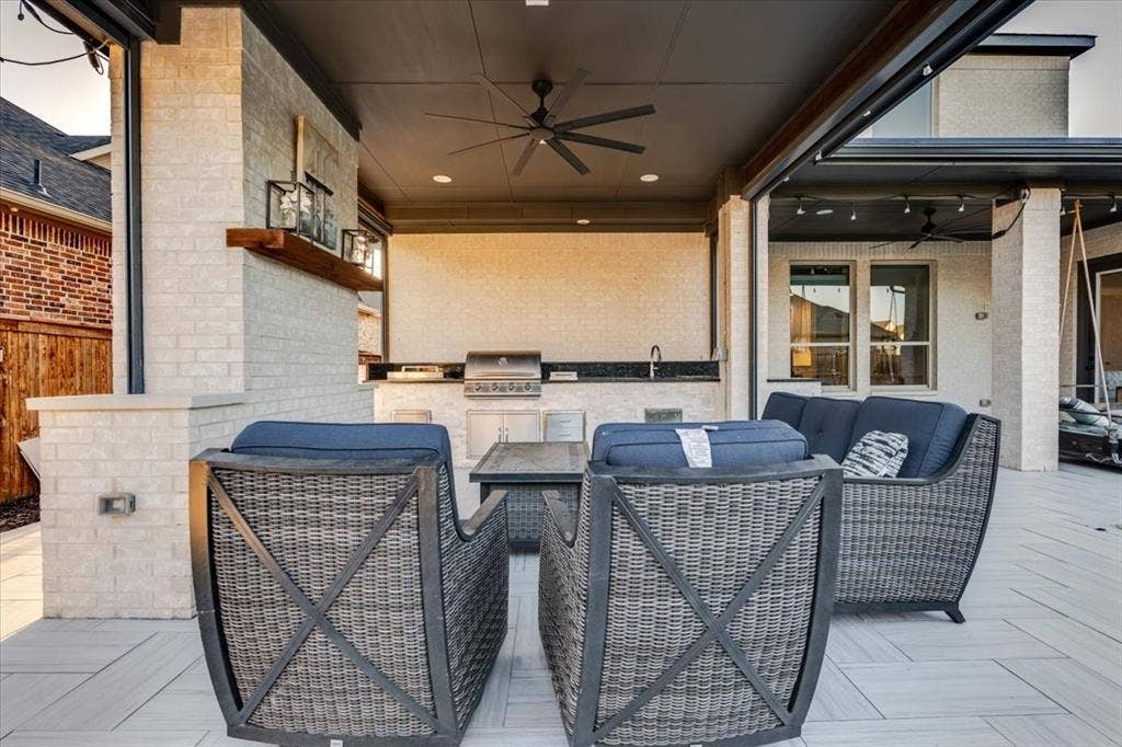 4102 Parkview Boulevard, Celina, TX 75009 Covered patio with a built-in outdoor kitchen, recessed lighting, ceiling fan, and tiled flooring