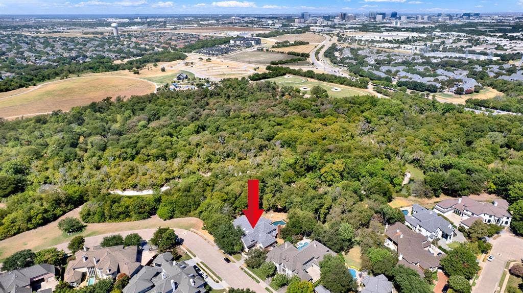 5237 SKY LAKE Drive, Plano, TX 75093 Nestled deep within a dense forest greenspace, the estate offers total privacy against distant skyline views. Start your morning sipping coffee on the balcony while taking in endless green views.