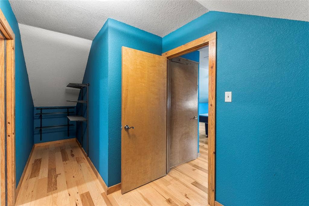 5459 Woodland Shores Drive, Log Cabin, TX 75148 Large closet space located between the game room and bunk room.