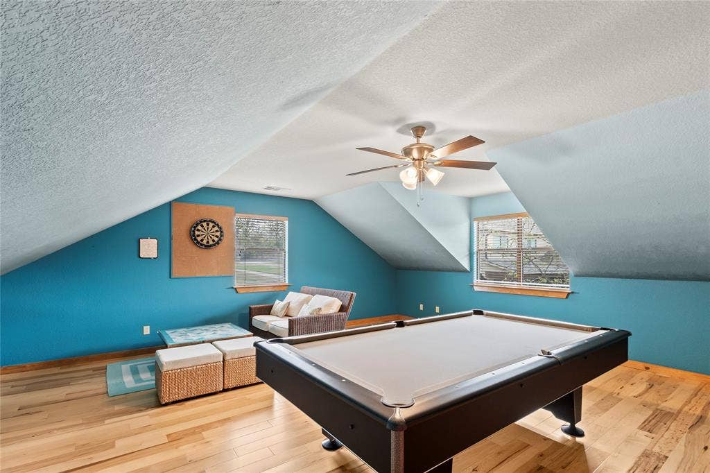 5459 Woodland Shores Drive, Log Cabin, TX 75148 Spacious game room perfect for evening family fun.