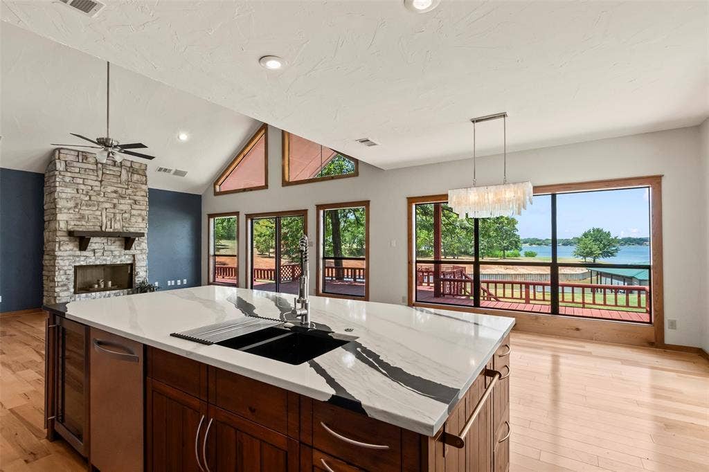 5459 Woodland Shores Drive, Log Cabin, TX 75148 Stunning open water views from this expansive island with brand new countertops, sink, faucet.
