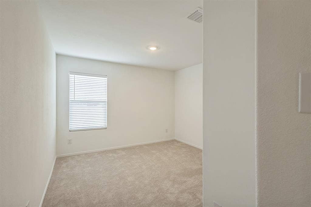 7904 Thornton Drive, McKinney, TX 75071 Recessed lighting, neutral wall finishes, window with blinds, and carpeting
