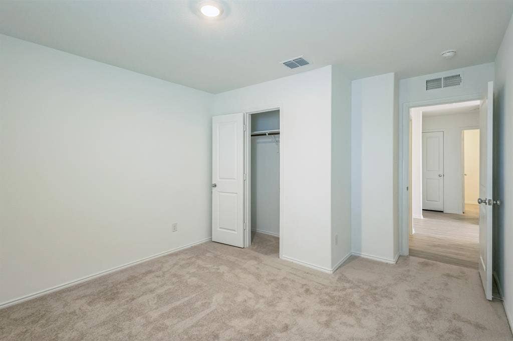 7904 Thornton Drive, McKinney, TX 75071 Plush carpeted flooring, a recessed ceiling light, and a built-in closet with a panel door