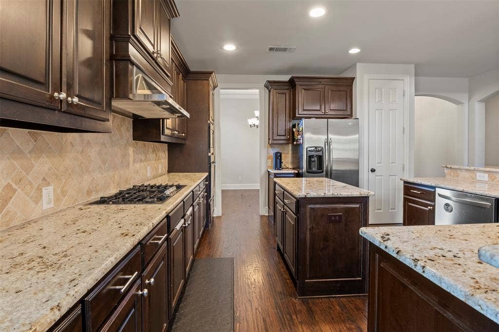 Large kitchen with plenty of counter space.
