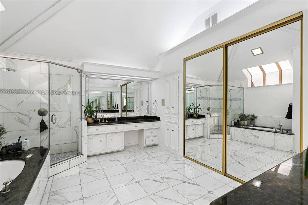 5716 Plumtree Drive, Dallas, TX 75252 Spacious! Dual vanities , soaking tub and luxury shower. indirect lighting and natural light. Lot's of storage.