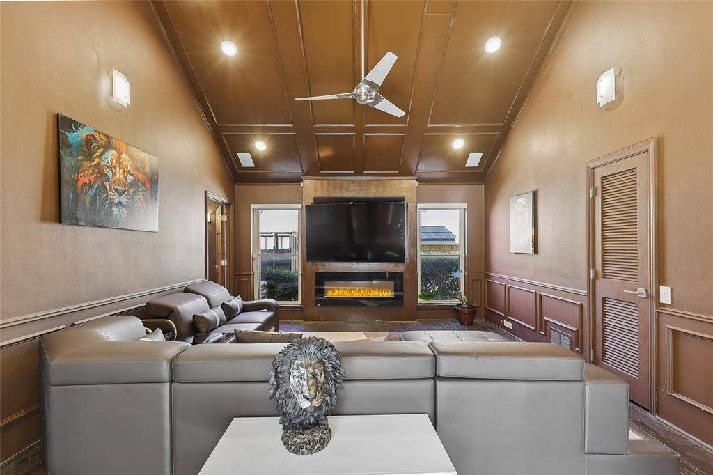 5716 Plumtree Drive, Dallas, TX 75252 Vaulted ceiling with decorative molding and recessed lighting could be paired with media room to make a great in-law or guest suite.
