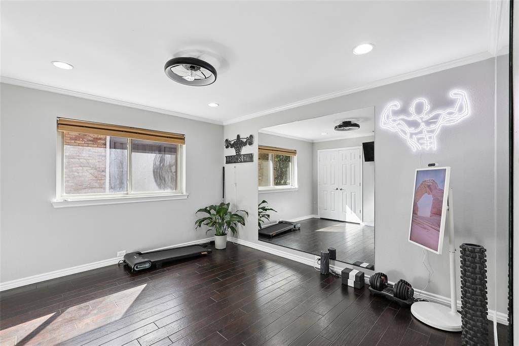 5716 Plumtree Drive, Dallas, TX 75252 Recessed lighting with a contemporary ceiling fan, wood-finish flooring, and light gray walls