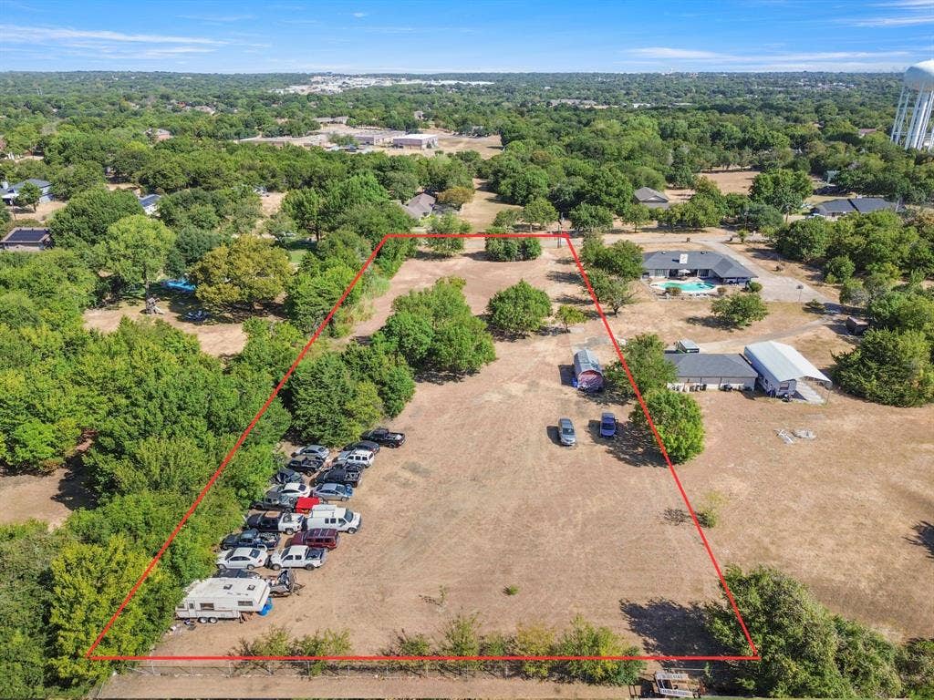 1022 Sherman Drive, Cedar Hill, TX 75104 Expansive land parcel featuring open terrain and mature trees