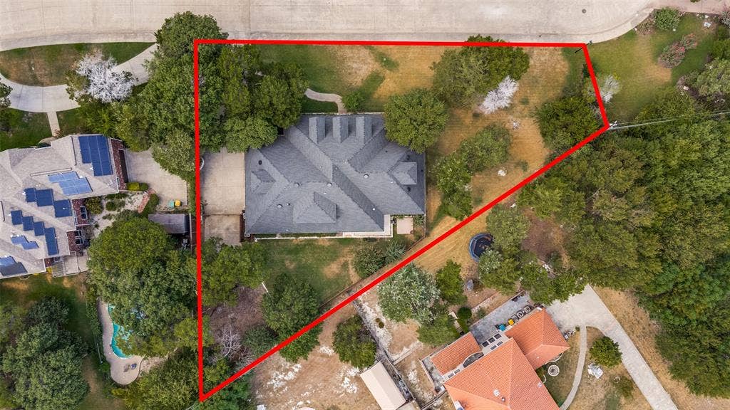 806 Cobblestone Court, Cedar Hill, TX 75104 Property with mature tree coverage, a multi-gabled roofline, and a paved driveway
