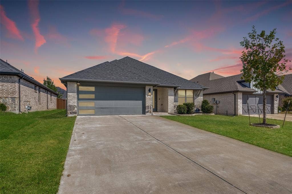 632 Cherry Hills Road, Red Oak, TX 75154 Brick and stone exterior with a dark gray shingle roof