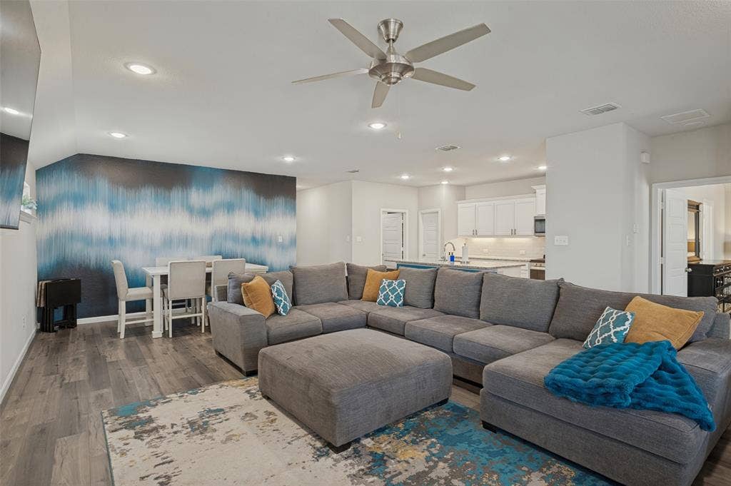 632 Cherry Hills Road, Red Oak, TX 75154 Open-concept living area with wood-finish flooring, recessed lighting, and a ceiling fan