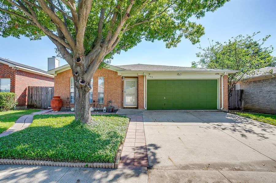 Property photo for 704 Charles City Drive, Arlington, TX