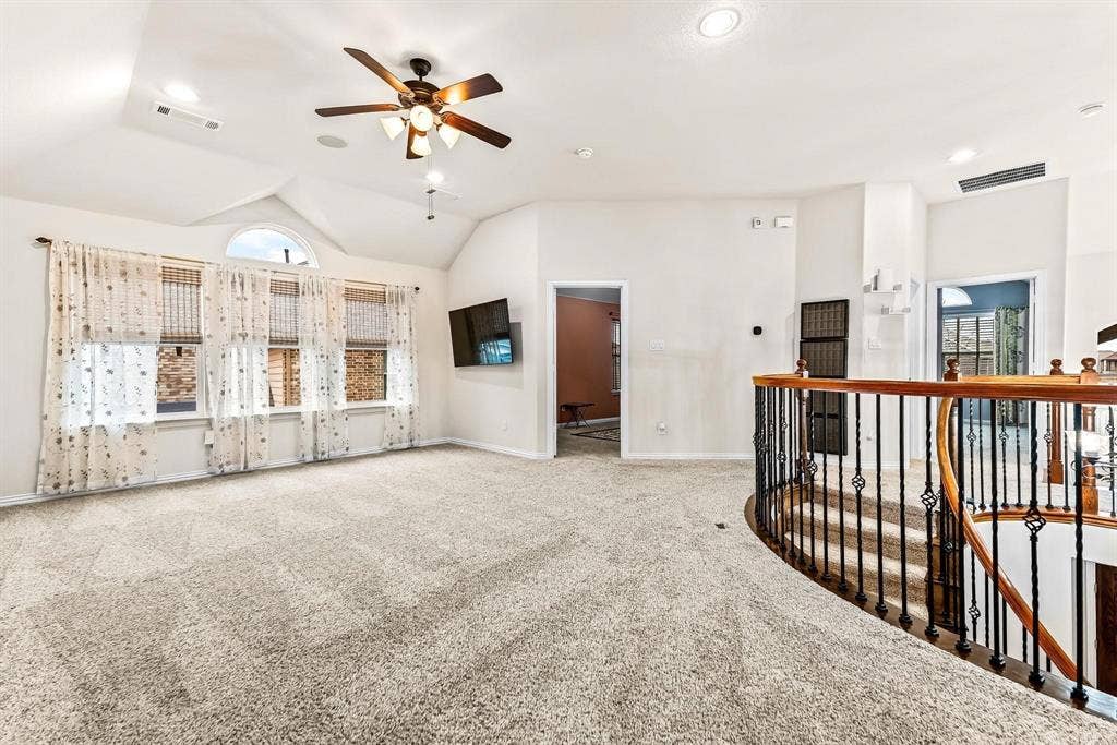 12467 Fallcreek Drive, Frisco, TX 75035 Vaulted ceiling with recessed lighting and a ceiling fan