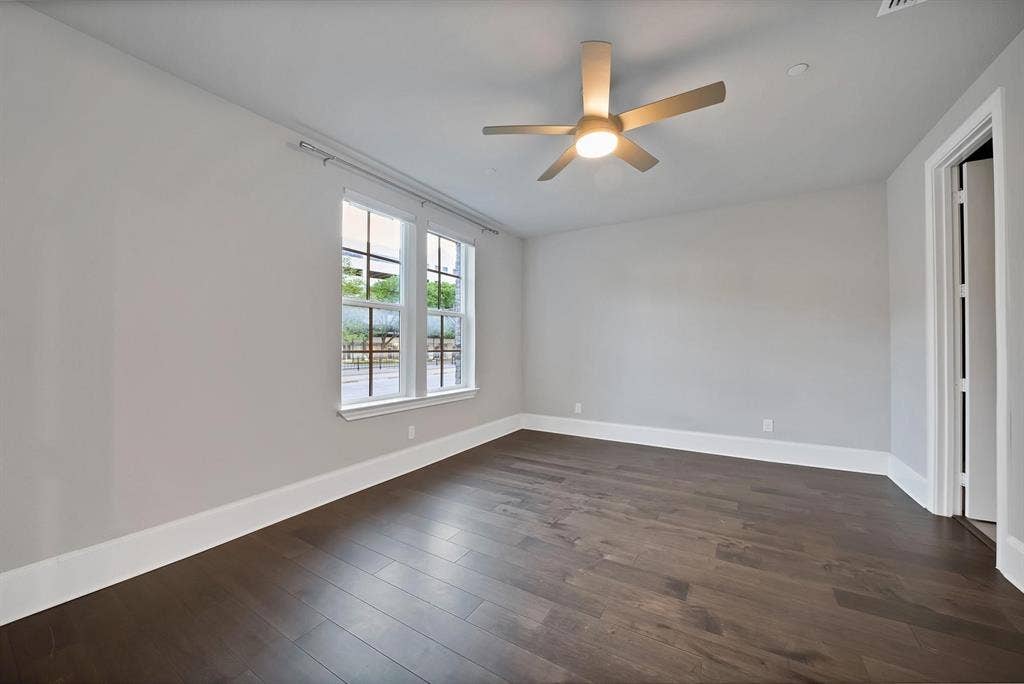 Wood-finish flooring with crisp white trim