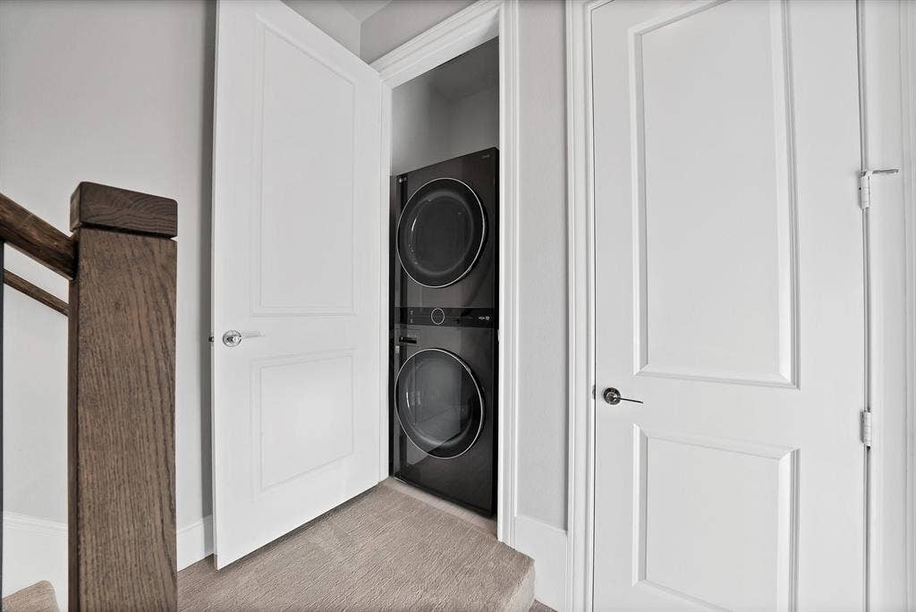 Stacked washer and dryer unit