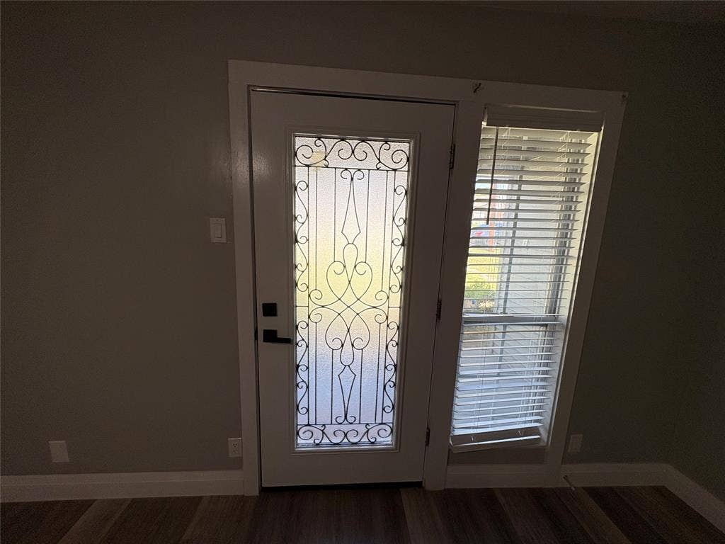 705 Vine Street, Euless, TX 76040 new decorative iron accent front door at covered front porch