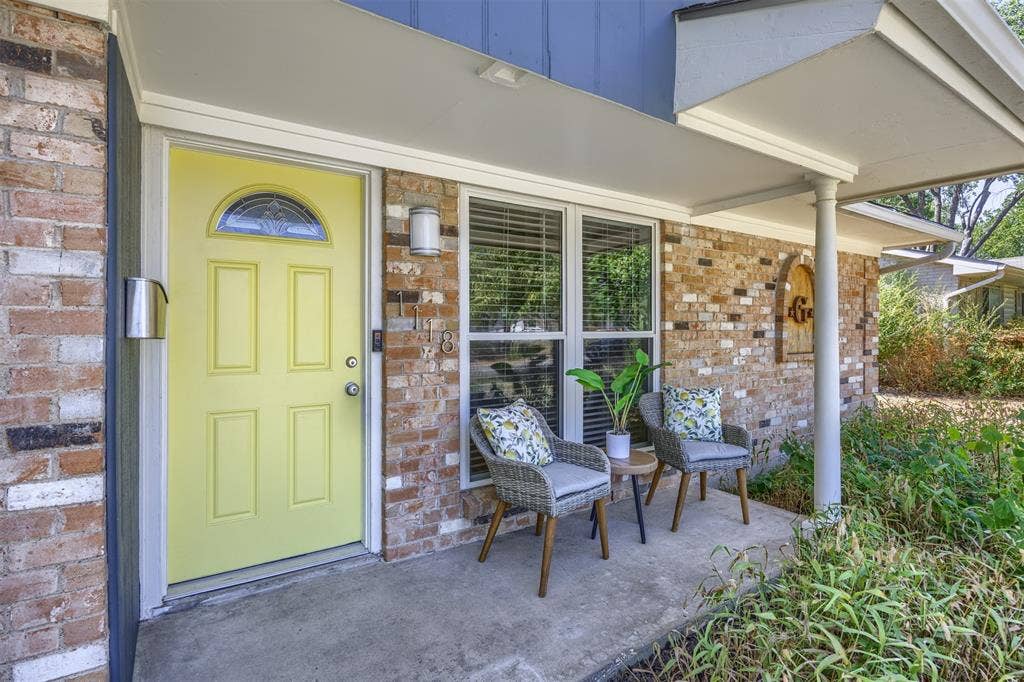 1118 Pacific Drive, Richardson, TX 75081 Brick exterior with an inviting covered porch