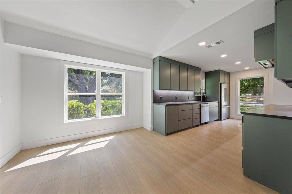 9917 Sandalwood Drive, Woodway, TX 76712 Installed soon: a natural wood wrapped beam, light fixtures, and kitchen cabinetry hardware