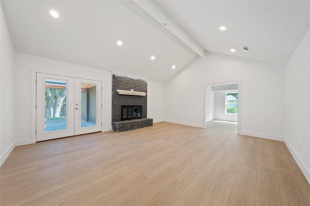 9917 Sandalwood Drive, Woodway, TX 76712 Installed soon: a custom fireplace, light fixtures, and natural wooden ceiling beam
