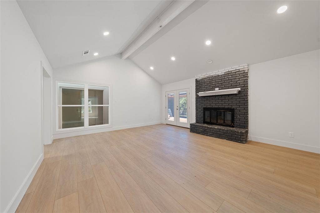 9917 Sandalwood Drive, Woodway, TX 76712 Installed soon: a custom fireplace, light fixtures, and natural wooden ceiling beam
