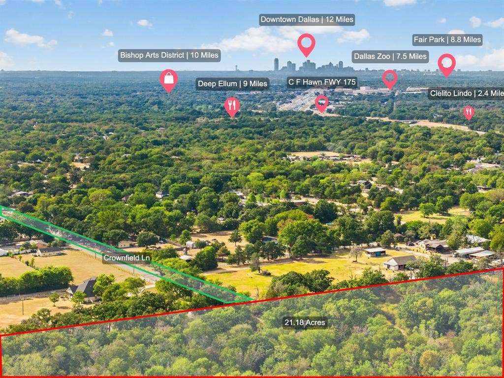 19 No Name Street, Dallas, TX 75217 21.18 acres of undeveloped land with mature trees and a distant cityscape