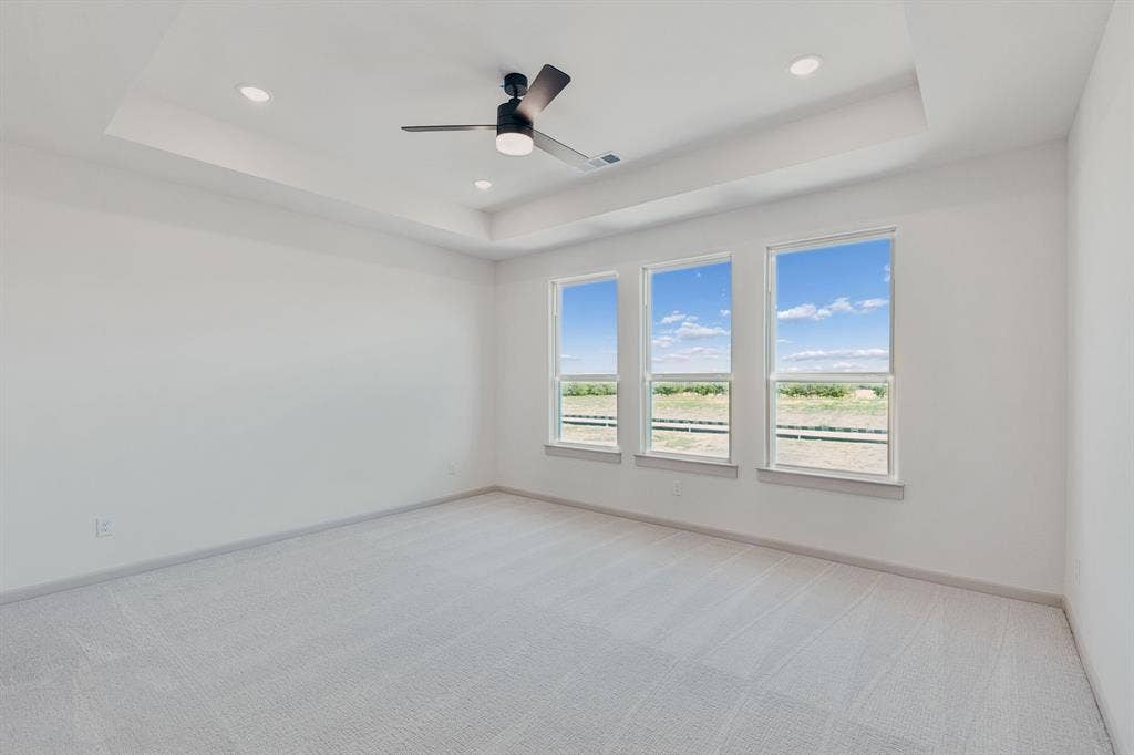 328 Walker Parkway, Celina, TX 75009 The peaceful owner's suite is located at the back of the home for additional privacy.