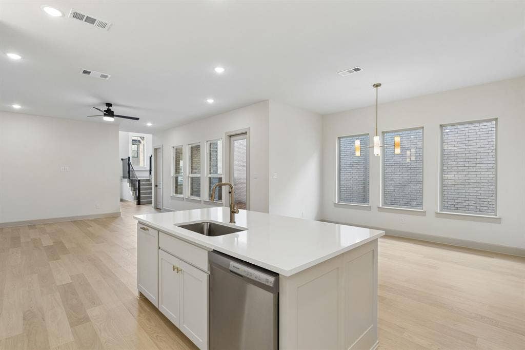 328 Walker Parkway, Celina, TX 75009 With the kitchen open to the dining and family rooms, the chef in the family will never be left out of the party!