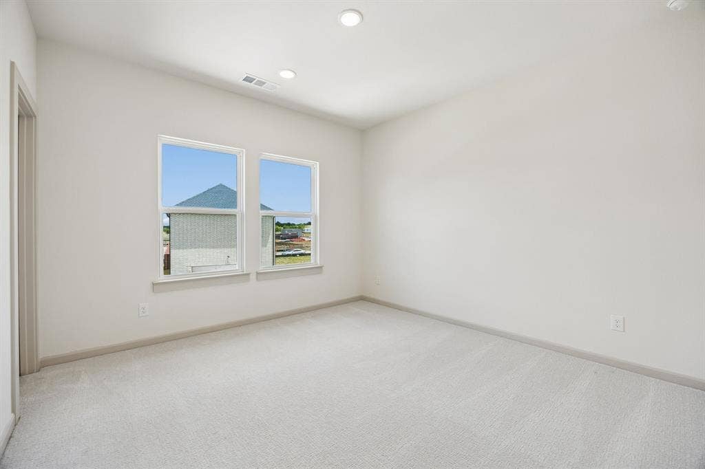 312 Callum Parkway, Celina, TX 75009 You'll find nicely sized secondary bedrooms in our Giselle floor plan.