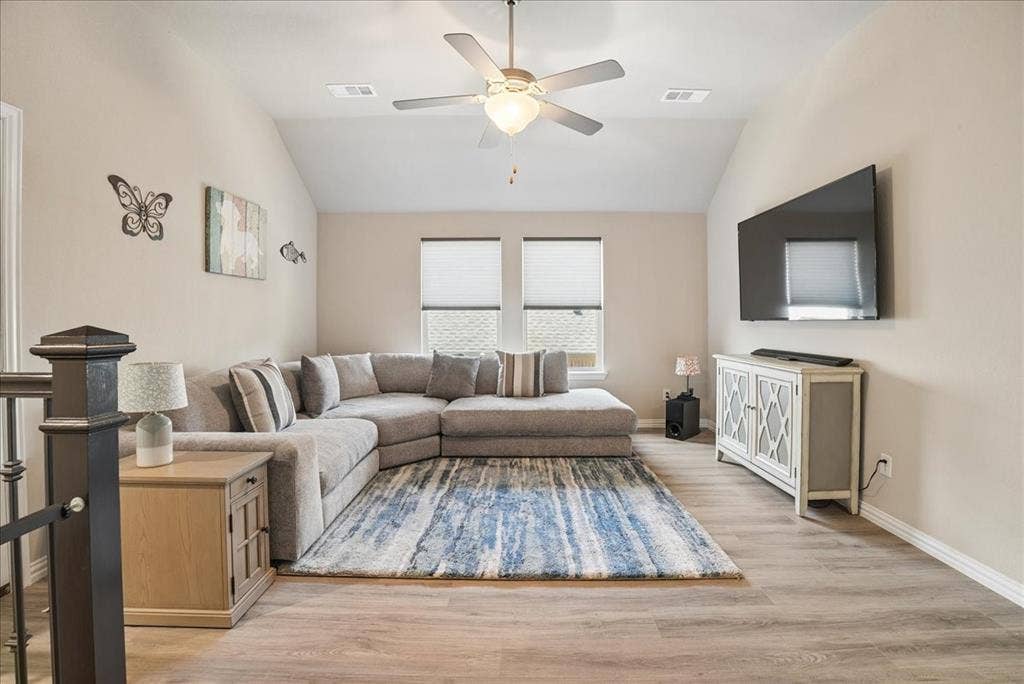 2206 Wellington Lane, Corinth, TX 76210 Spacious upstairs game room perfect for relaxing and entertaining.