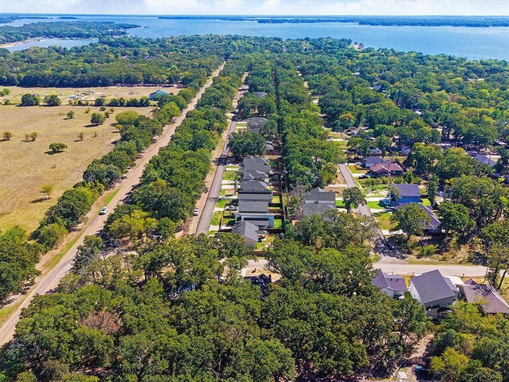 82 Indian Harbor Drive, Mabank, TX 75156 Expansive green space and wooded areas surrounding residential properties